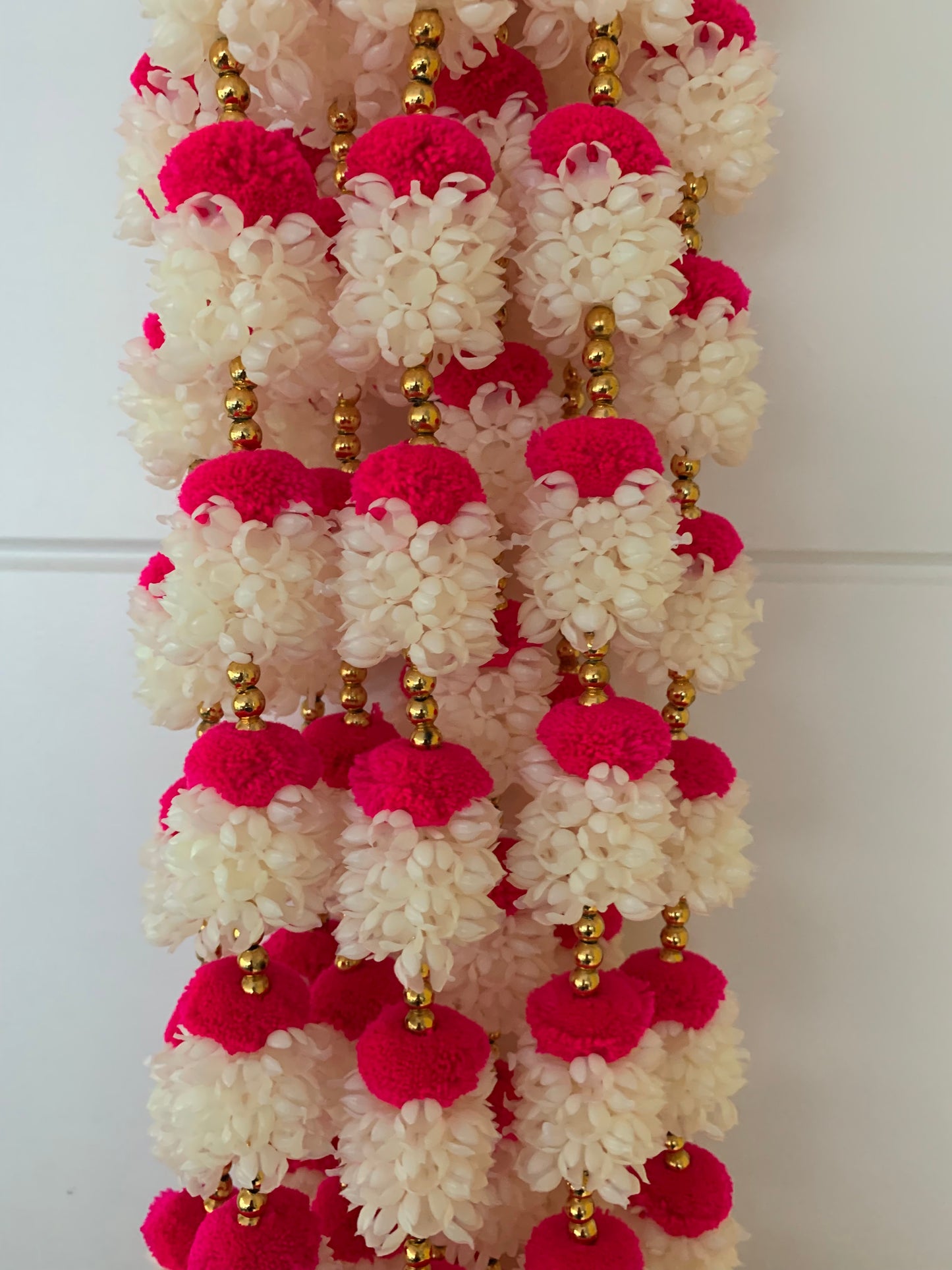 Handmade Red and white floral Hanging Decoration for Weddings and Festive Occasions.