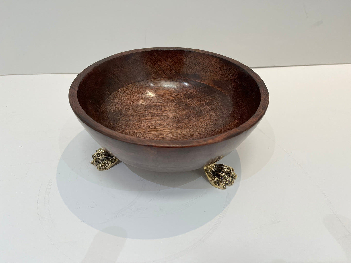 Beautiful wooden salad bowl with tongs