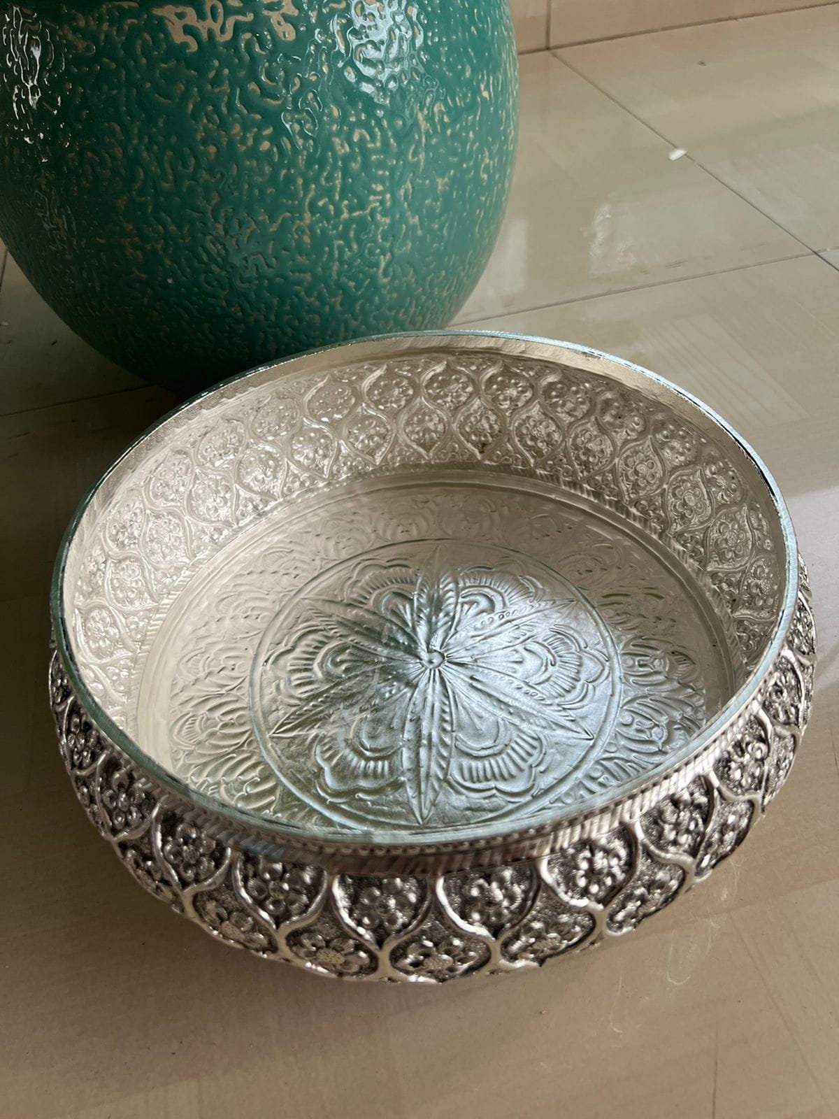 German Silver Decorative Urli with intricate carving.