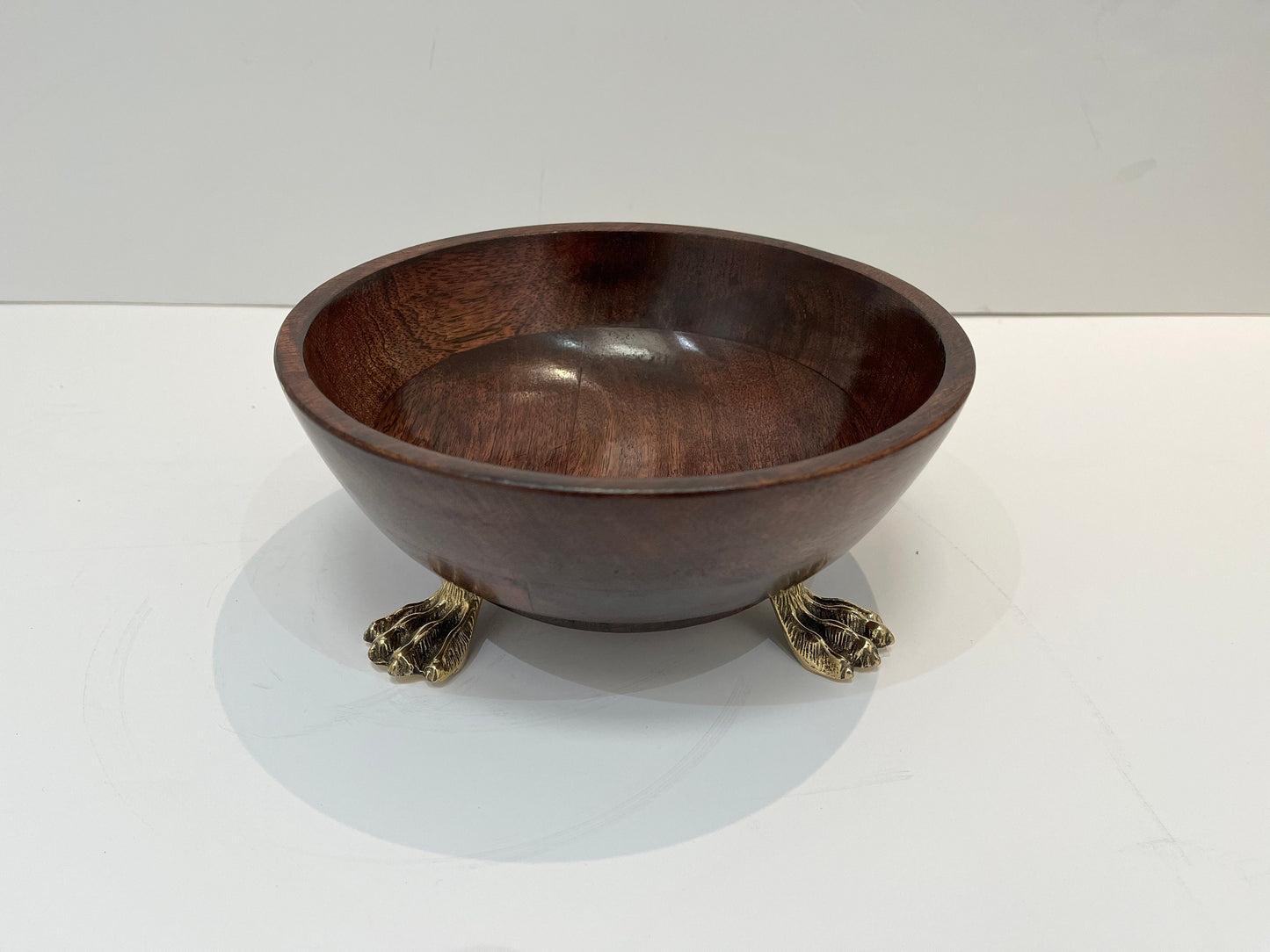 Beautiful wooden salad bowl with tongs