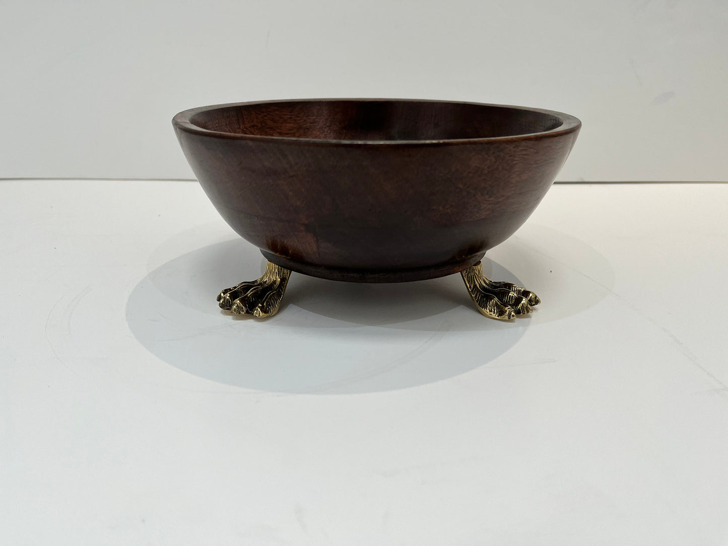 Beautiful wooden salad bowl with tongs