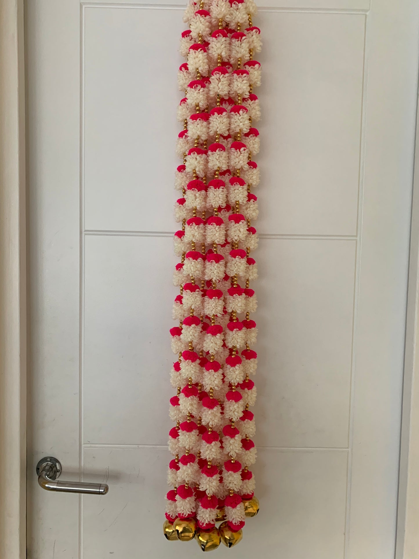 Handmade Red and white floral Hanging Decoration for Weddings and Festive Occasions.