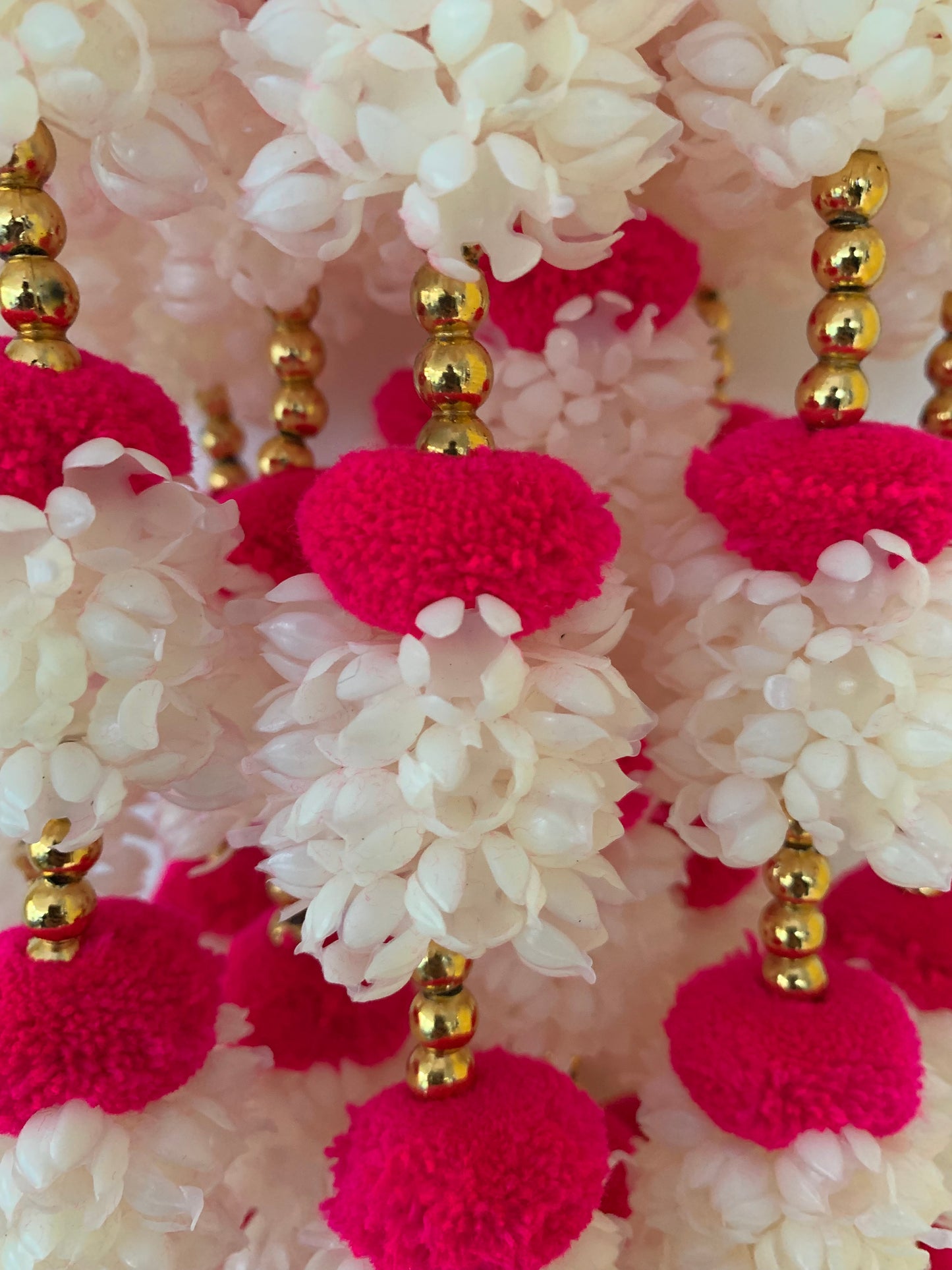 Handmade Red and white floral Hanging Decoration for Weddings and Festive Occasions.