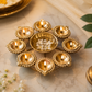 Festive Gold Urli Centerpiece.