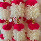 Handmade Red and white floral Hanging Decoration for Weddings and Festive Occasions.