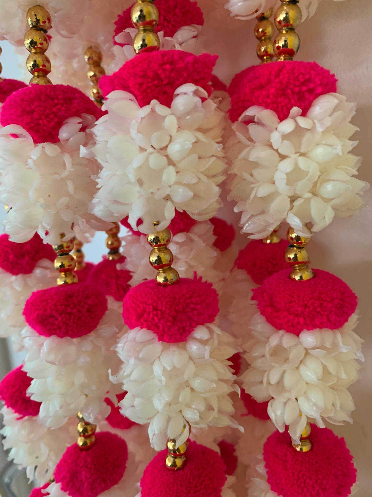 Handmade Red and white floral Hanging Decoration for Weddings and Festive Occasions.