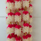 Handmade Red and white floral Hanging Decoration for Weddings and Festive Occasions.