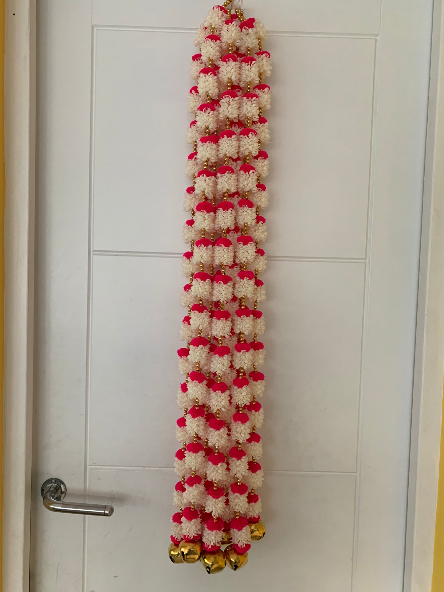 Handmade Red and white floral Hanging Decoration for Weddings and Festive Occasions.