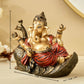 Handcrafted Ganesha resting on Peacock
