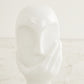 Face Figurine in Hand