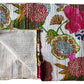 Handstitched Floral printed throw.