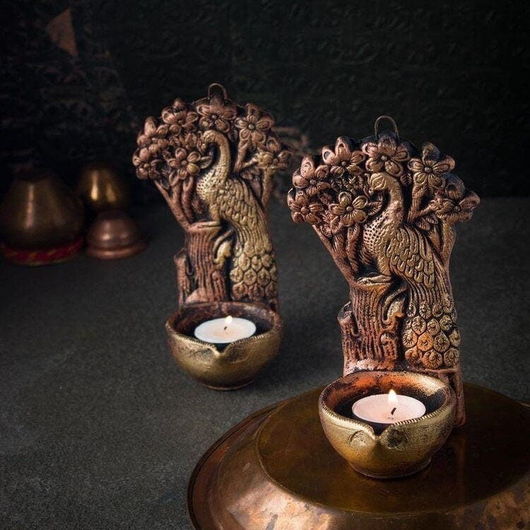 Terracotta tree peacock tea light holder (Diwali Diya) set in metallic colour. Set of 2