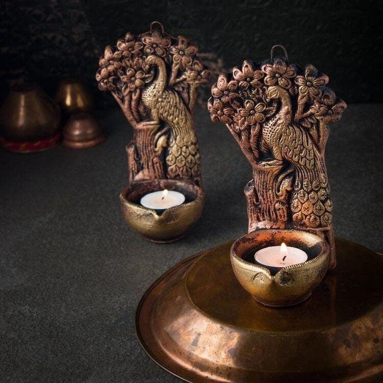 Terracotta tree peacock tea light holder (Diwali Diya) set in metallic colour. Set of 2