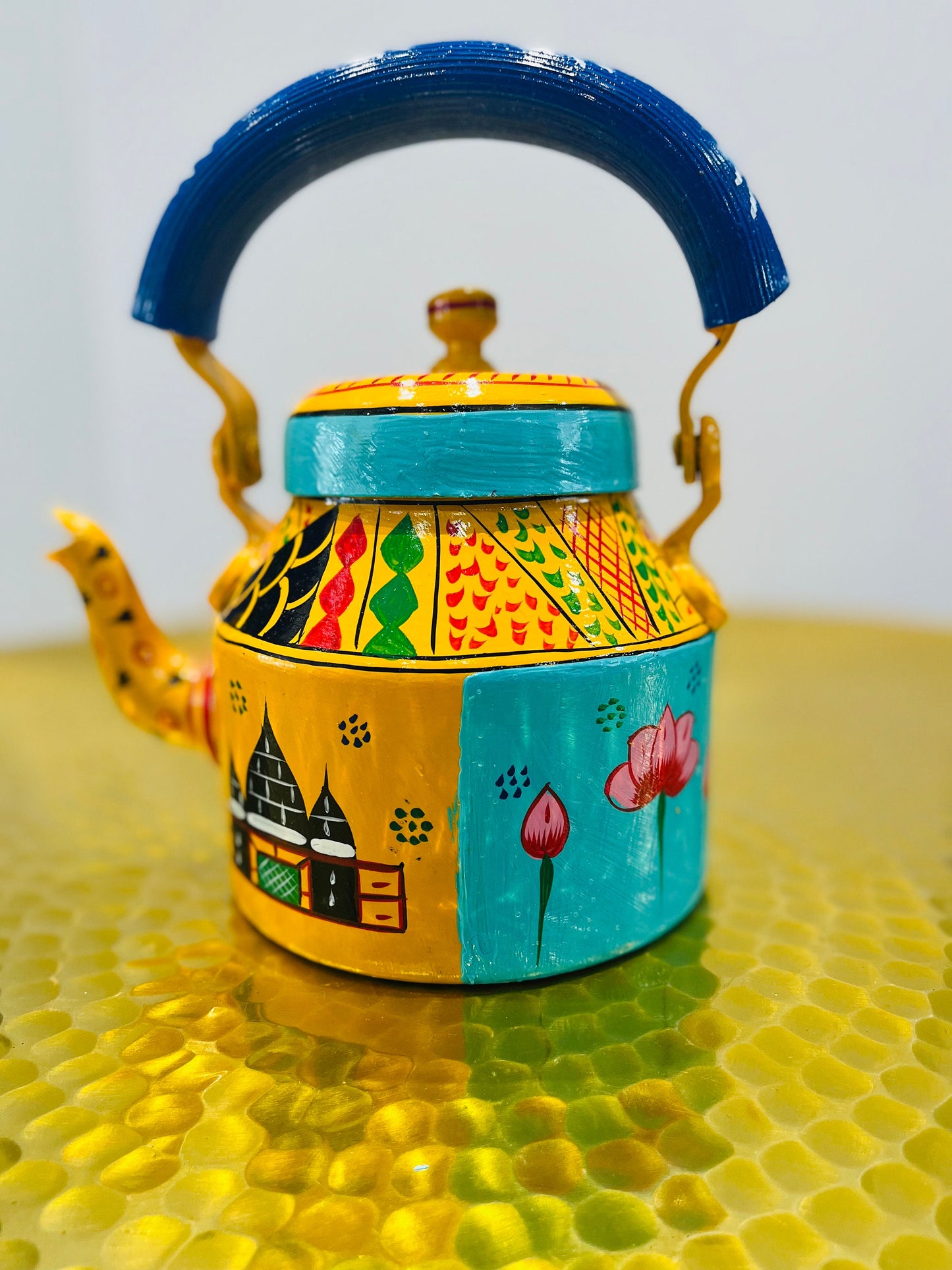 Handpainted indian tea kettle with 6 glasses and a kart.