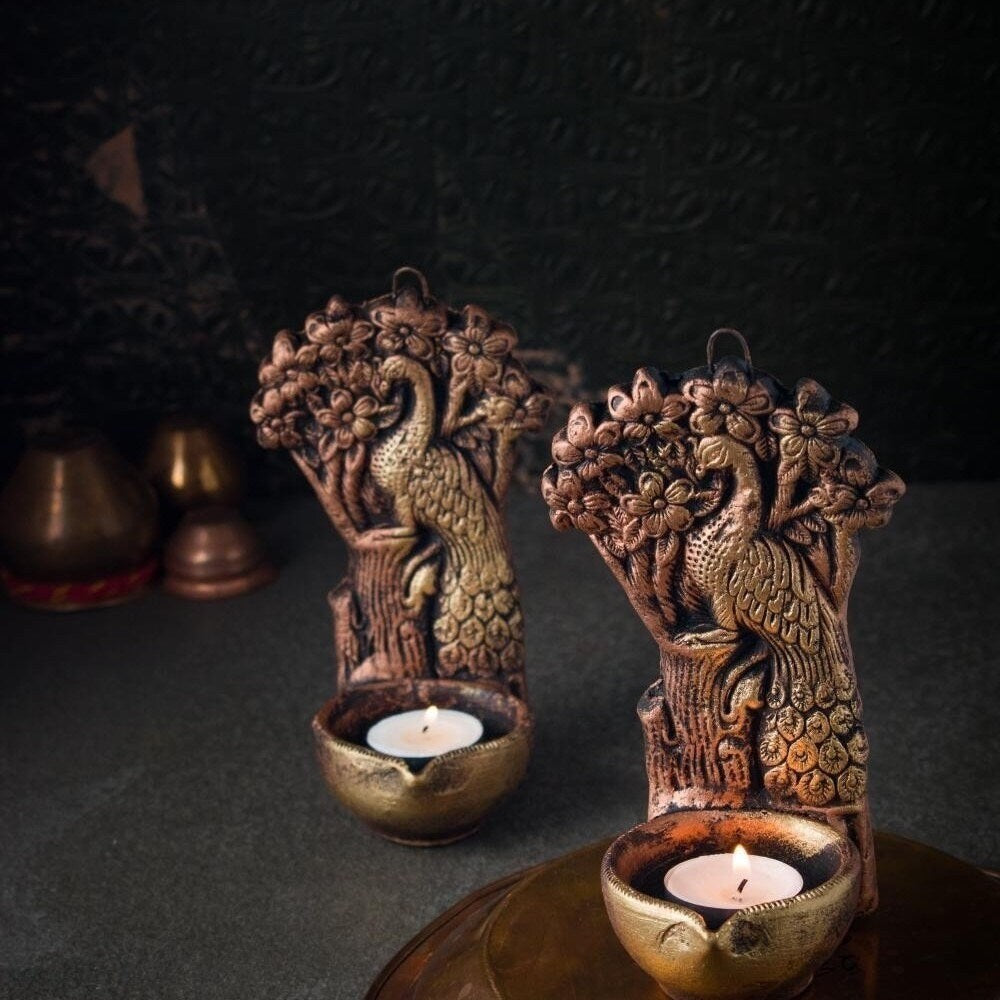 Terracotta tree peacock tea light holder (Diwali Diya) set in metallic colour. Set of 2