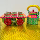 Handpainted indian tea kettle with 6 glasses and a kart.