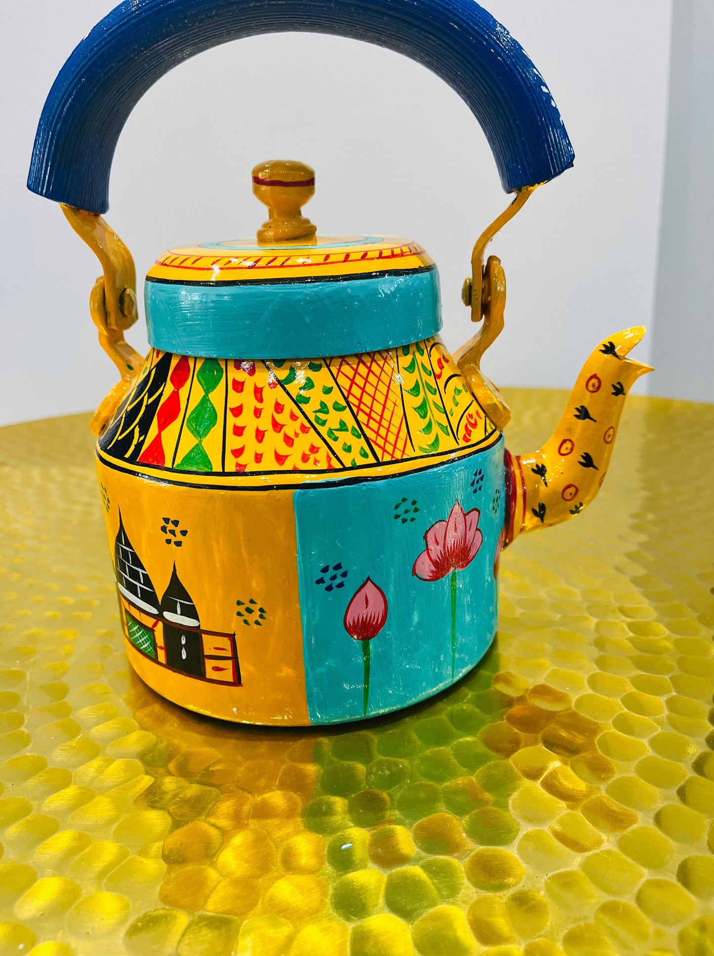 Handpainted indian tea kettle with 6 glasses and a kart.